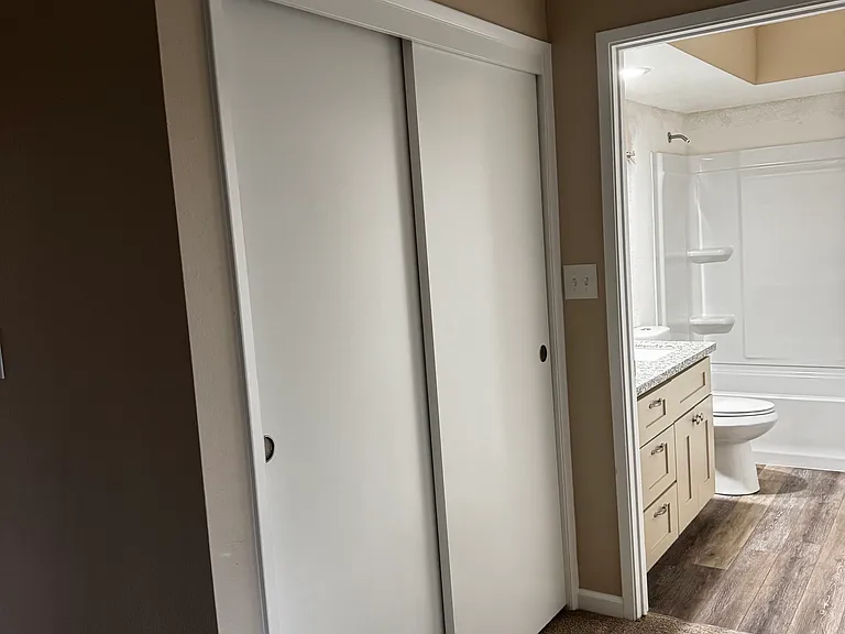 Hallway to Primary Bath (Left side)
