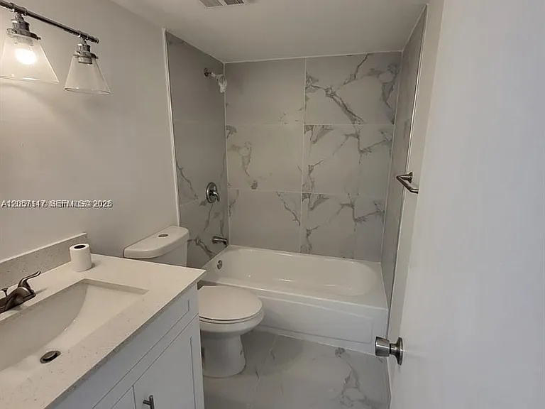 8670 SW 212th St #306 — Photo 16