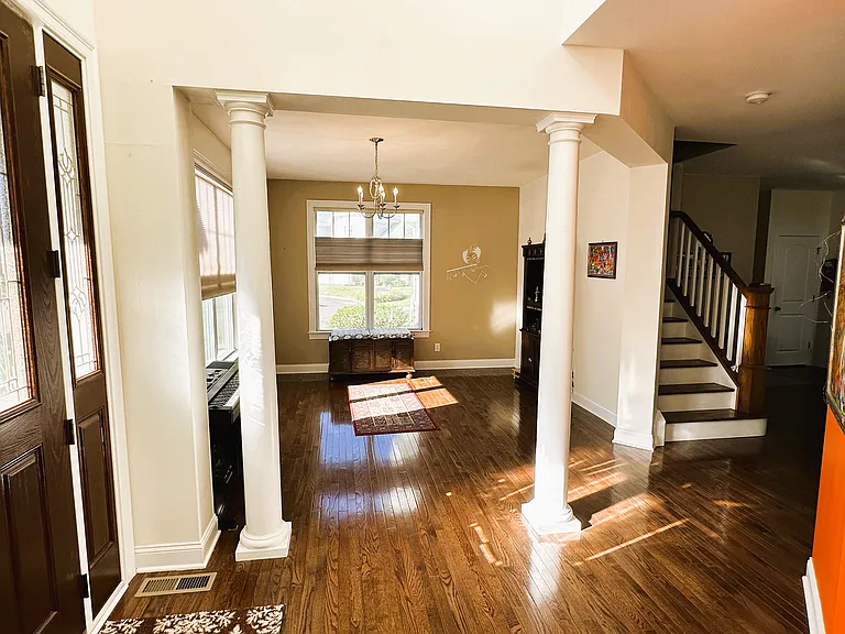 Music room/potential dining area ( room left hand side of main door), Stairs leading to 2nd floor