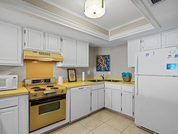 4th image of 10100 Beach Club Dr. #8E