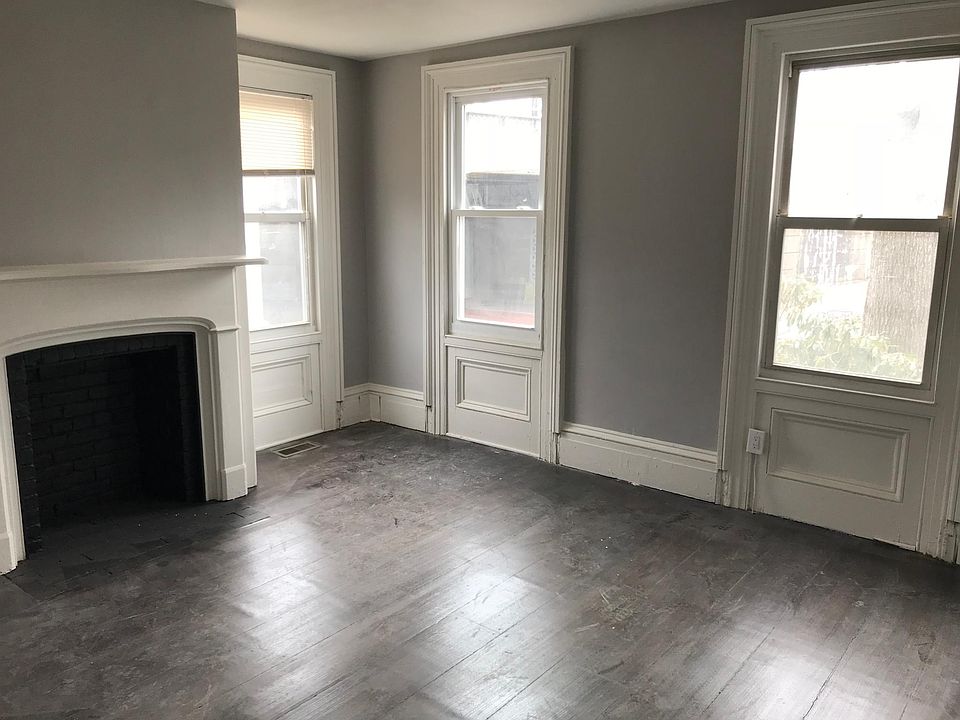 Master bedroom 2 - big windows for natural lighting and fireplace (closed)