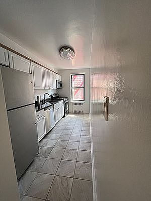 2nd image of 34-30 78th St #6