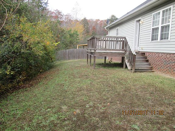 Back of the house, wooden deck