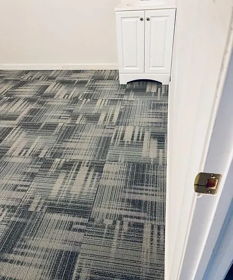 Bedroom has added sink and mirror
