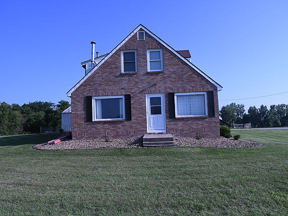 North side of house looking south. All open looking into trees and CRP ground.