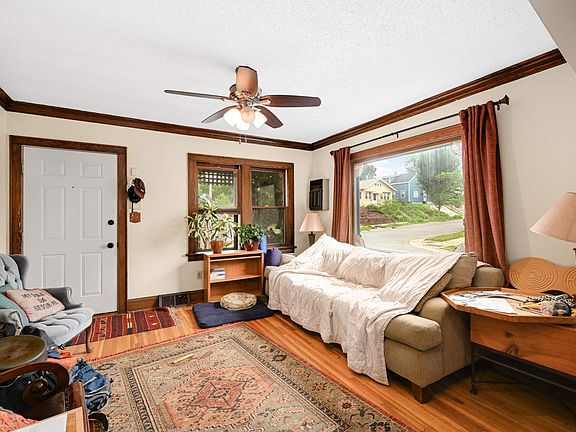 Living Room with tons of natural light, overlooking Sibley Park.