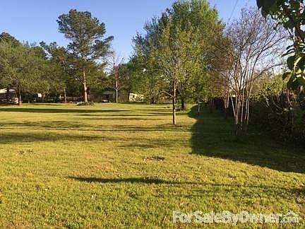 Looking south from NW corner of lot
						:
						Drought resistant trees added along west property line to help with late day sun