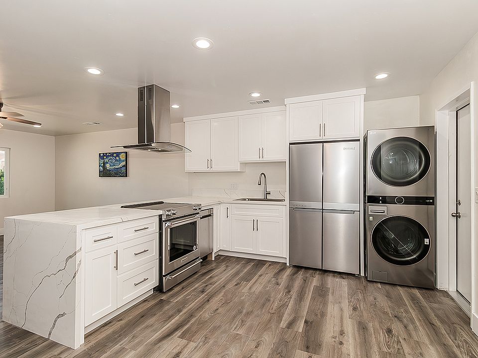 Luxury Kitchen and High End Appliances, LVP flooring, LED lighting.