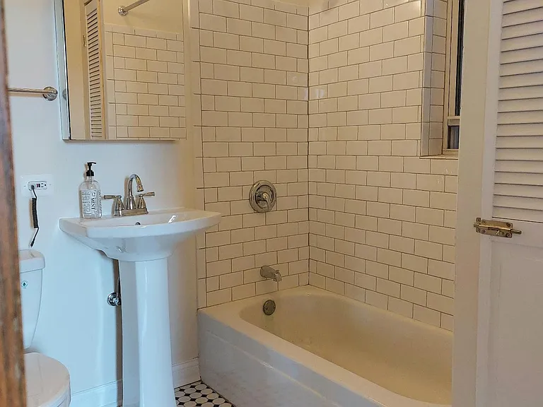 Bathroom with linen closet