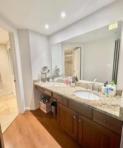 Huge counter with vanity space and giant mirror. Perfect for getting ready and for guests