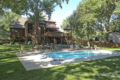 Amazing setting!  Go on vacation in your own backyard!!  So much space for entertaining!  You won't find a yard like this in new construction!