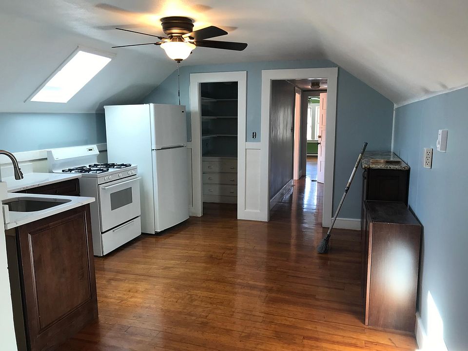 Kitchen with pantry and new gas stove and refrigerator