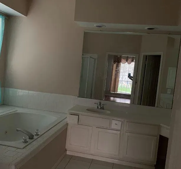 Master bath w/his, and her vanities