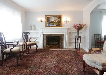 Living Room with Woodburning Fireplace