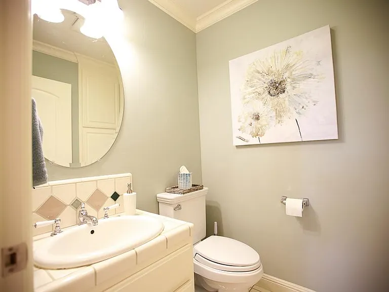 The half bathroom is perfectly located on the first floor with easy access from the living room, which means that the 2 remaining full bathrooms can remain private and off-limits to guests.