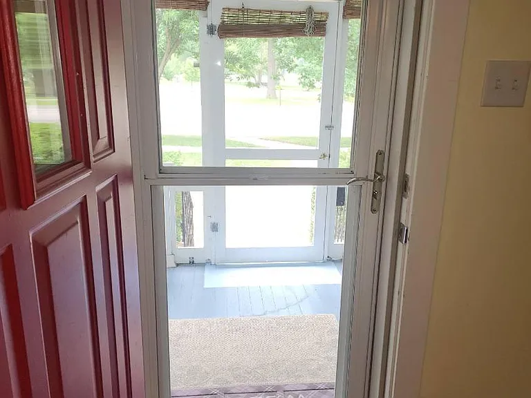 Front door to porch