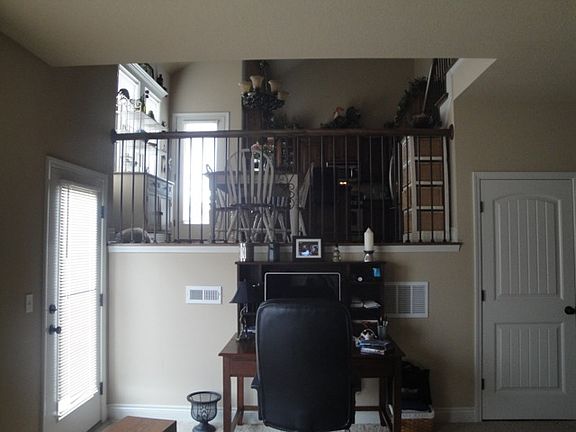 Family Room with kitchen above