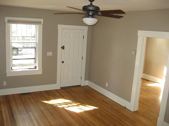Living room. Front door has been replaced, see photo of front of house.