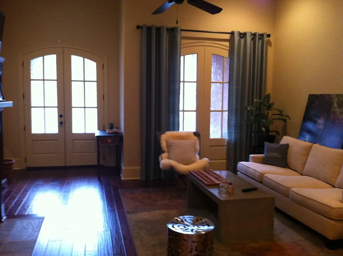 Looking on to the living room and front door from the dining room. Gas fireplace is to the left. - 120 Windberg Ln