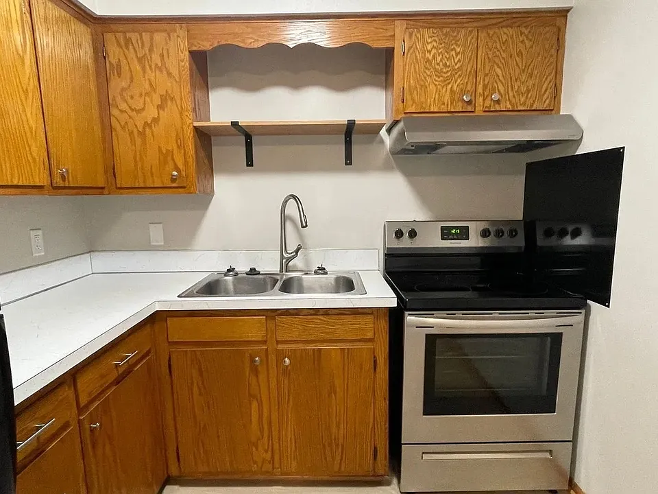 Elevate your culinary experience in the modern kitchen at LS Capital Group. Featuring sleek appliances and abundant storage, this space is designed for both style and functionality. Schedule a tour today to see it in person!