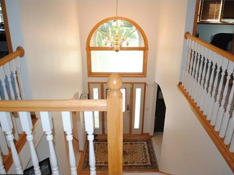 view to the front door from the upper level