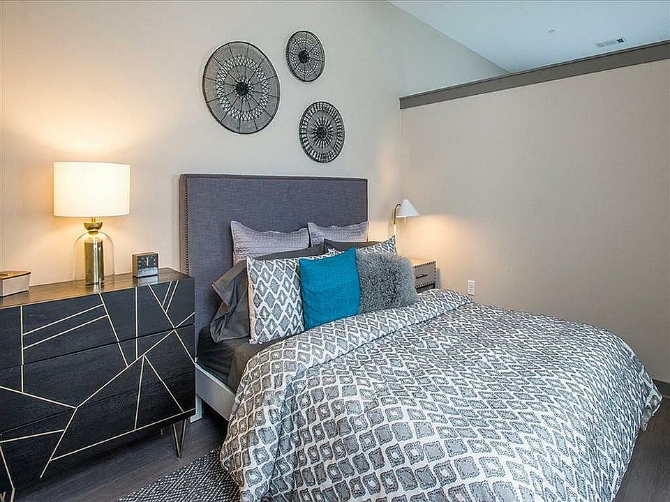 Experience comfort and style in this beautifully designed bedroom, perfect for relaxation.
