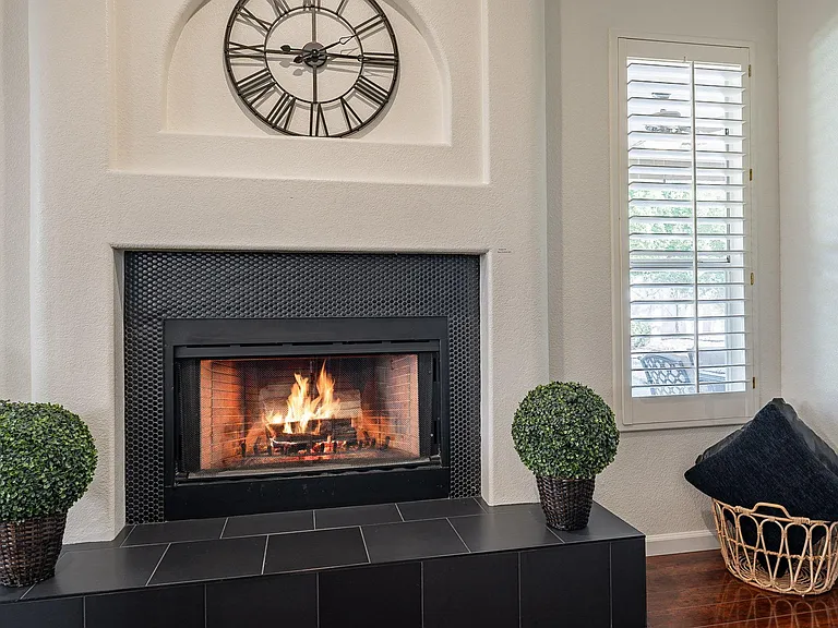 Family time around the wood burning fireplace