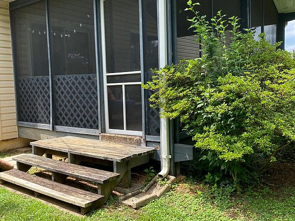 backyard access into screen-in porch