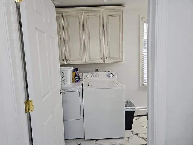 LAUNDRY AND 3/4 BATHROOM NEXT TO KITCHEN ON 1ST FLOOR