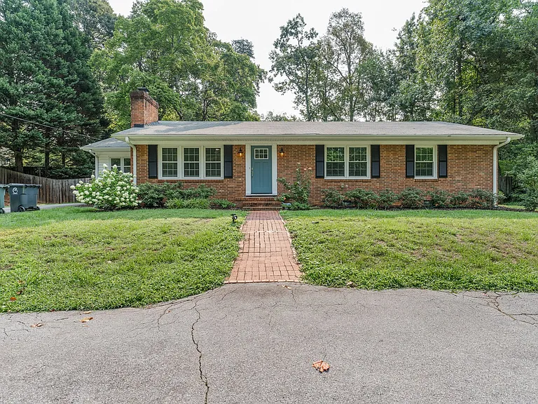 Beautiful classic Westridge brick ranch in popular North Greensboro, convenient to shops, restaurants, parks, and major highways. 3 bedroom/2 bath, plus office, completely renovated.