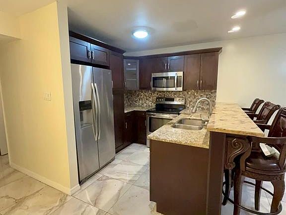 4th image of 9109 W HILLSBOROUGH AVENUE #J109