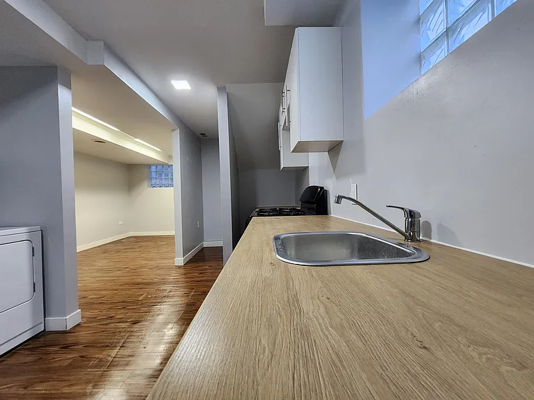 Brand new fridge will be placed in the nook towards the left of the photo