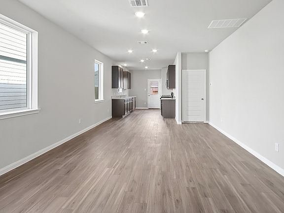 Family Room to Kitchen and Dining Area