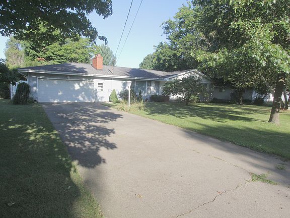 Paved drive to 2 car garage