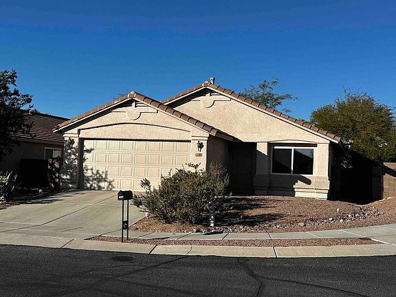 Front photo. Home is on a corner lot, with large side yard.