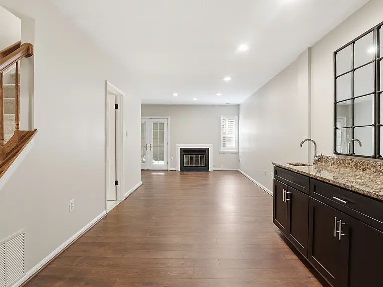 Basement Rec Room with Fireplace and Wet Bar