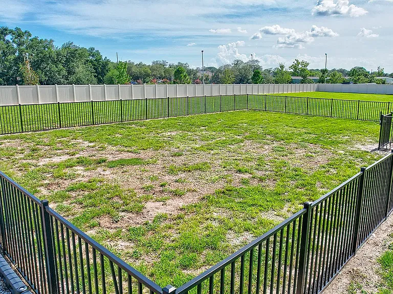 7715 Rosewood Garden Loop — Photo 26
