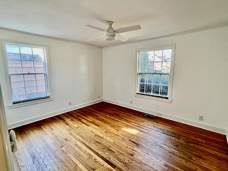 Primary bedroom with overhead ceiling fan