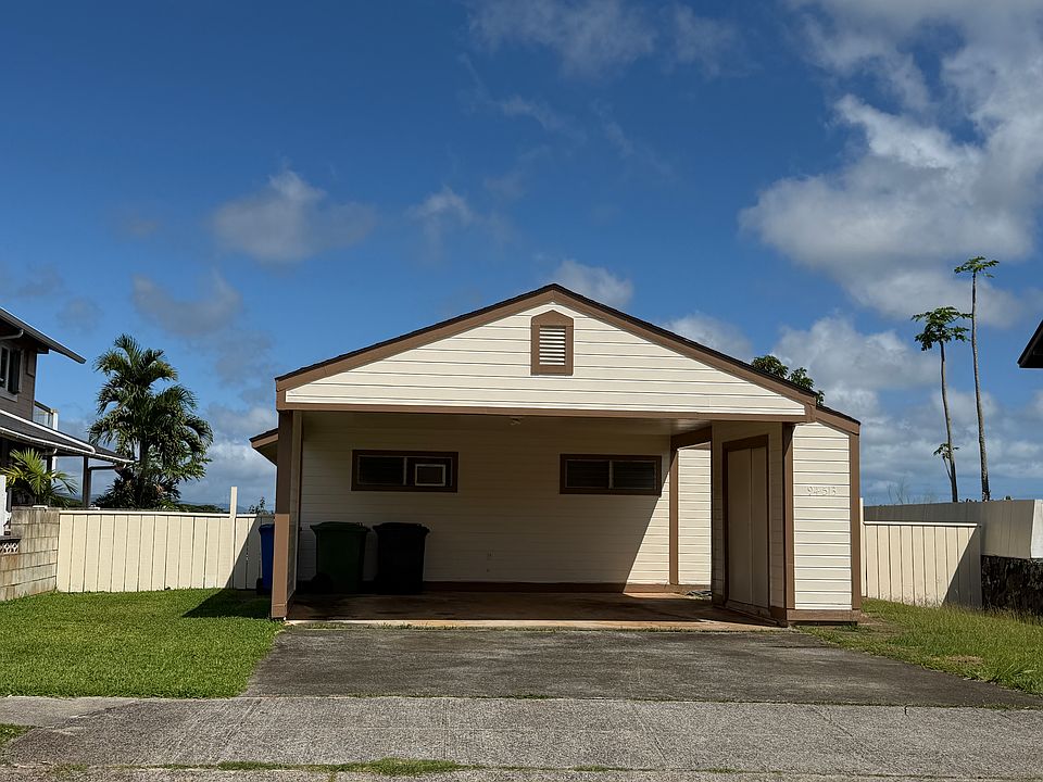 Front of home, fenced yard, 2 car carport with storage, driveway with parking for 2 additional cars, and street parking is also available.