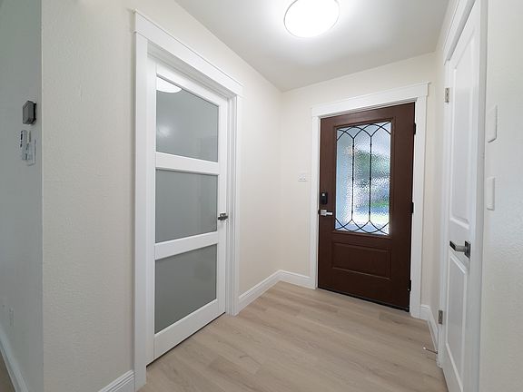 Entryway, with bonus room shown to the left and coat closet to the right.