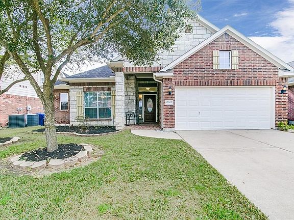 Brick and Stone elevation on this lovely home.
