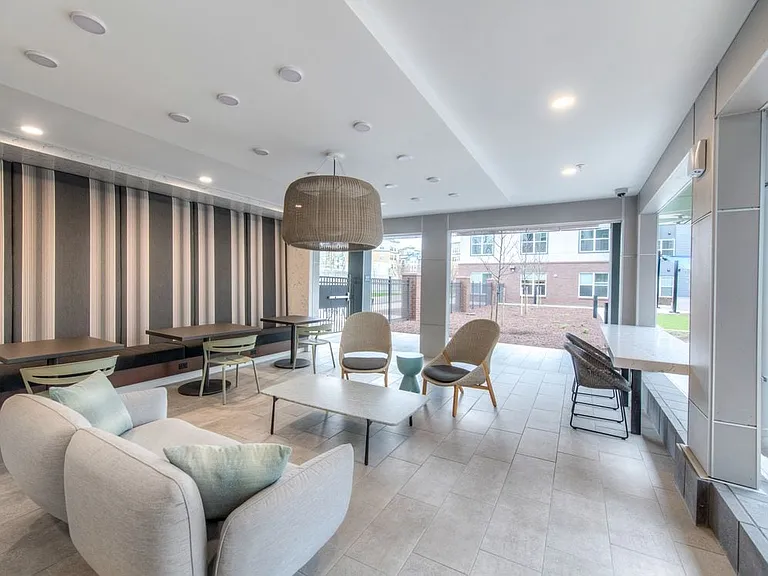 Outdoor lounge with multiple seating areas