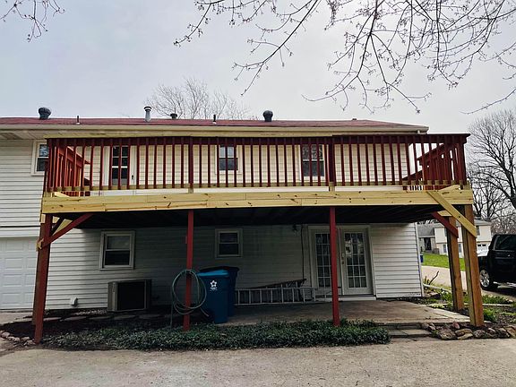 Extra large balcony deck with covered walk out patio