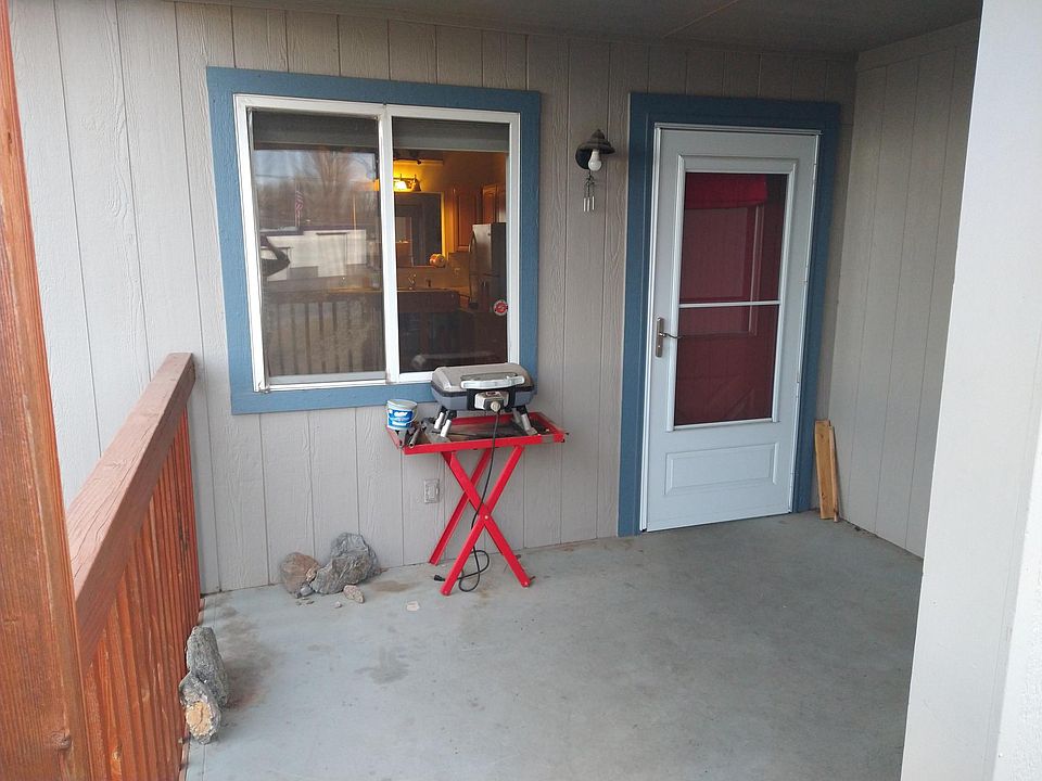 Back covered patio with electric grill