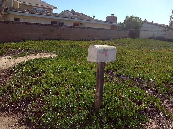 FRONT NW CORNER OF  LOT