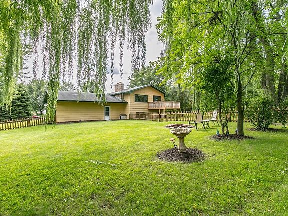 fenced backyard with deck