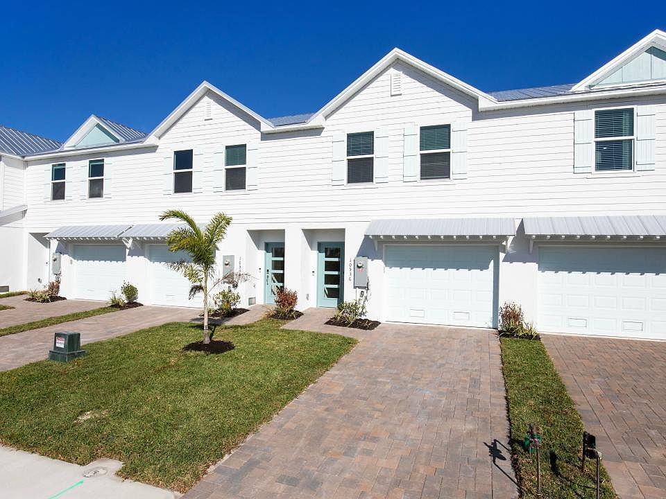 Bright, charming exteriors with metal roofs offer simple, low-maintenance living.