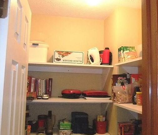 Walk-in pantry in kitchen.