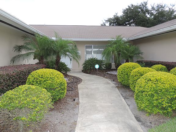NICELY LANDSCAPED ENTRANCE