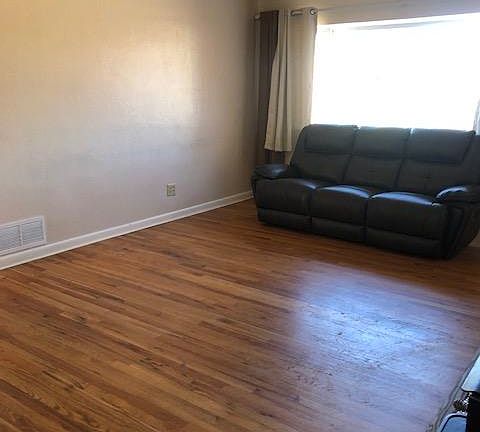 Hardwood Floors and Bay window in Living Room